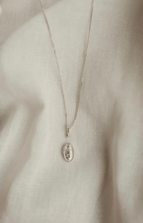 Forget-Me-Not Oval Cremains Urn Necklace - Sterling Silver — product image 1